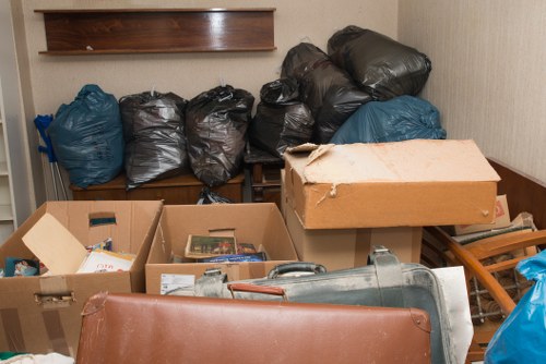 Efficient house clearance team at work in a Penge home